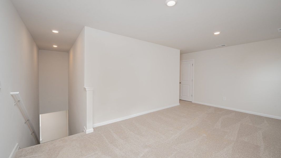 Spacious, unfurnished interior of a new home in Indigo Preserve, Leland (Image 18).