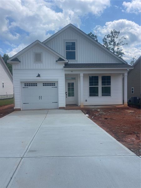 Front exterior of a new home in Springwood Grove, Central, SC, highlighting curb appeal (Image 1). Front exterior of a new home in Springwood Grove, Central, SC, highlighting curb appeal (Image 1).