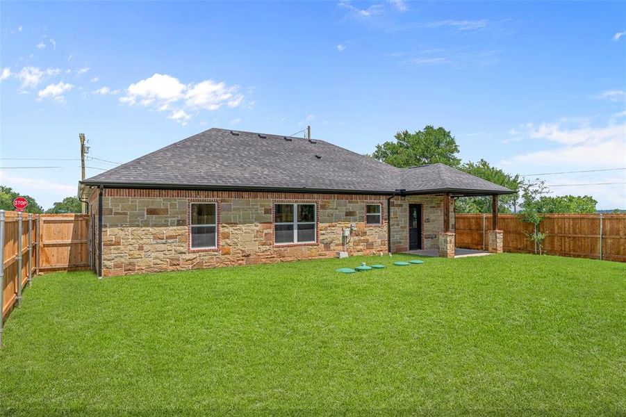 Front exterior of a new home in , Granbury, TX, highlighting curb appeal (Image 22).