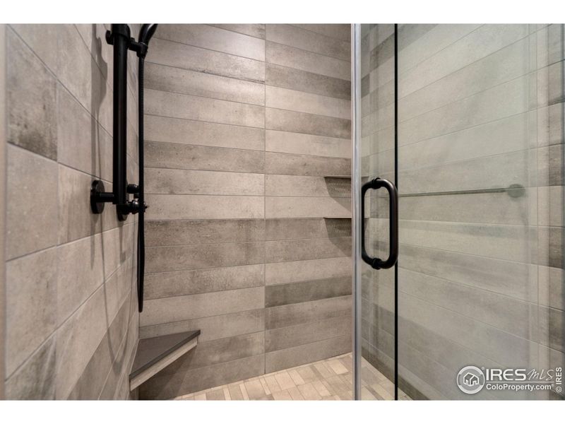 Large shower, tiled ceiling to floor