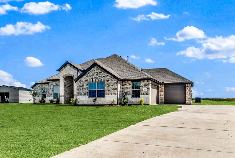 Front exterior of a new home in Berkshire Estates, Mesquite, TX, highlighting curb appeal (Image 21).