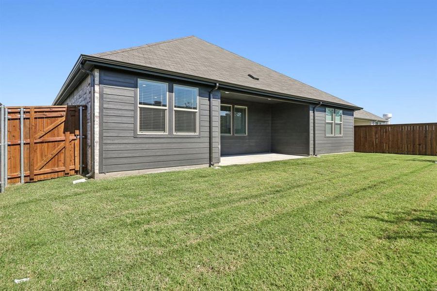 Exterior details and patio area of a home in Lakehaven - Premier Series, Farmersville (Image 3). Exterior details and patio area of a home in Lakehaven - Premier Series, Farmersville (Image 3).