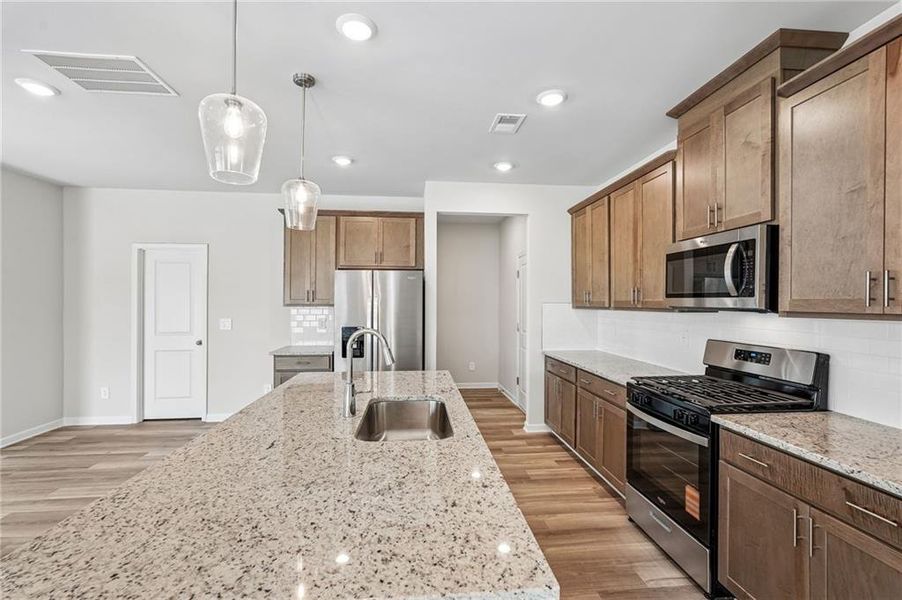 Furnished interior view inside a new home in Northwoods at Mirror Lake, Villa Rica (Image 6).