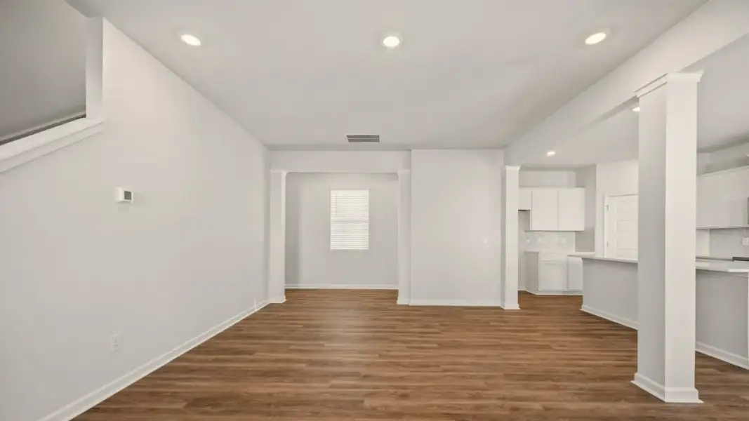 Representative unfurnished interior of a home built from the Somerset by D.R. Horton in Branford Crossing, Stockbridge (Image 17).