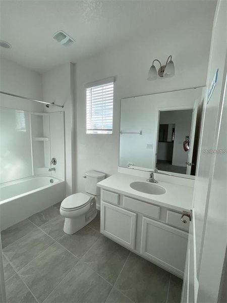 Furnished interior view inside a new home in , Kissimmee (Image 5).