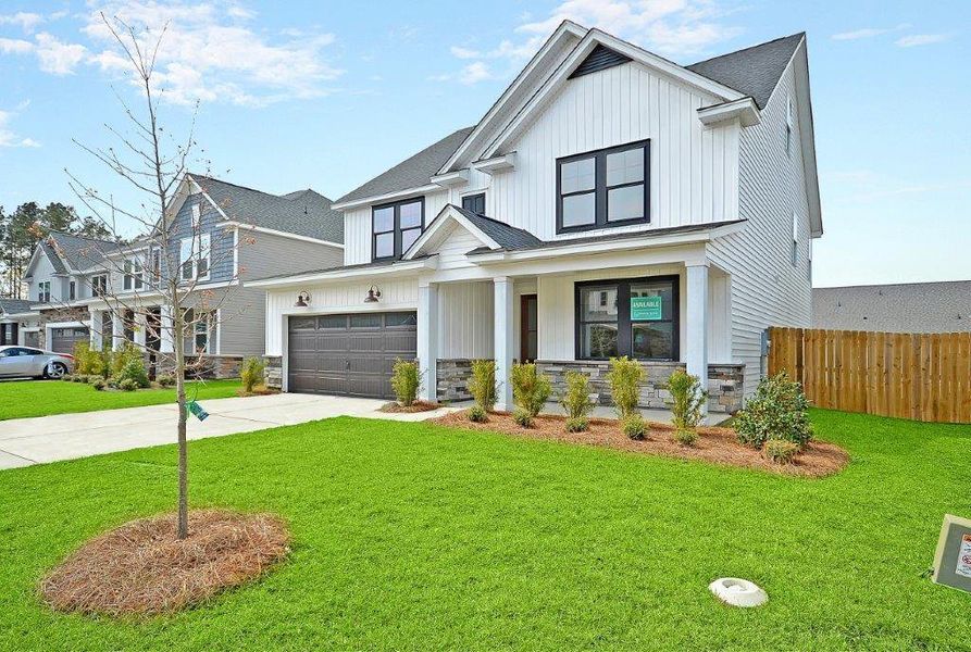 Front exterior of a new home in Indigo Place, North Charleston, SC, highlighting curb appeal (Image 2).