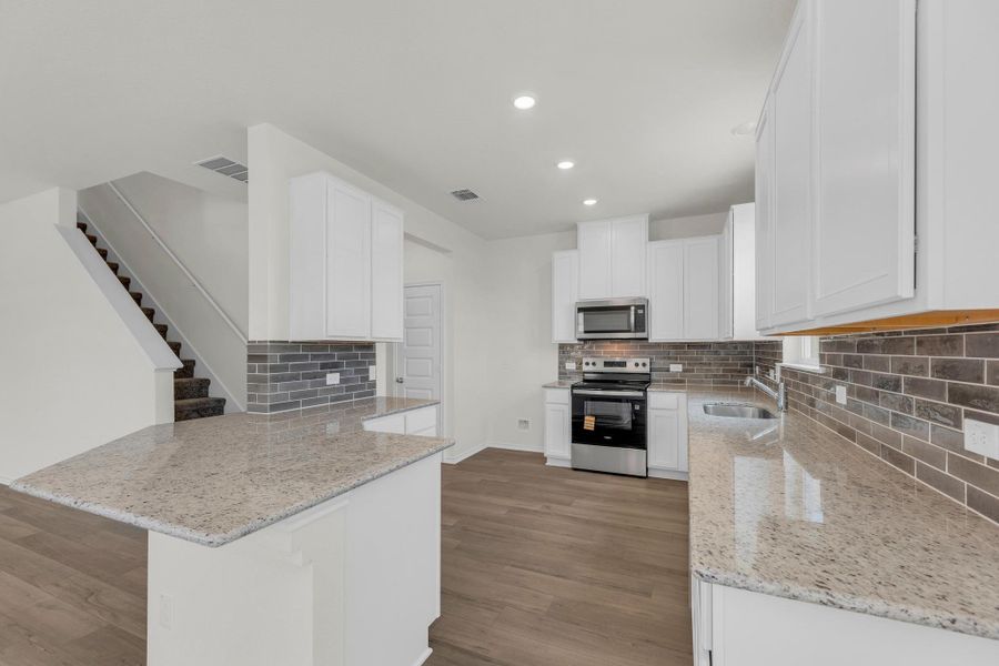 Furnished interior view inside a new home in Sonterra - Cool Water, Jarrell (Image 8).