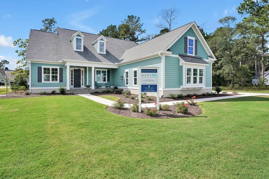 Exterior details and patio area of a home in The Bluffs On the Cape Fear, Leland (Image 2).