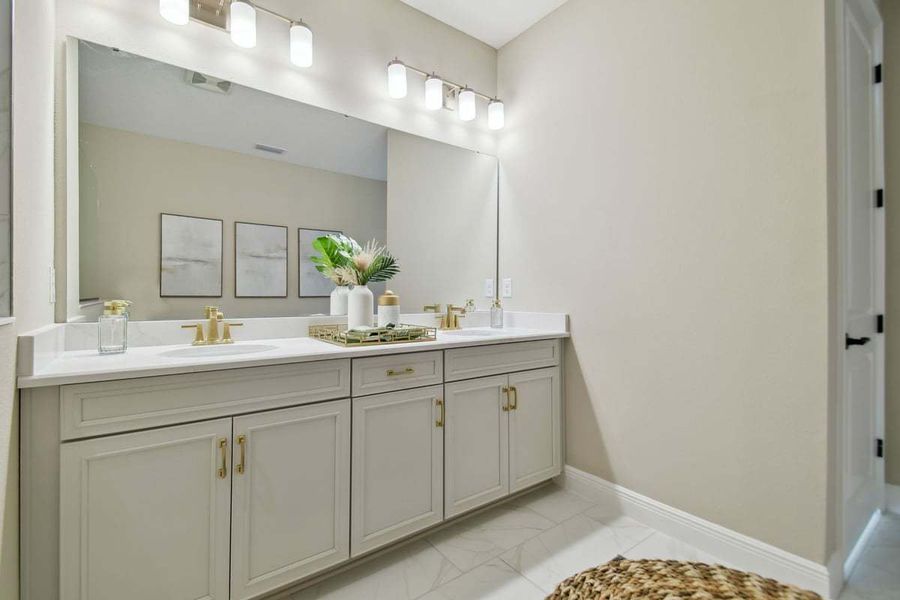 Furnished interior view inside a new home in The Sanctuary – Royal Collection, Punta Gorda (Image 31).