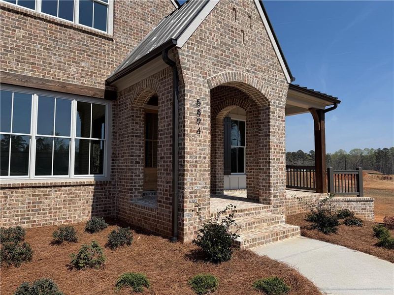 Exterior details and patio area of a home in Woodford, Acworth (Image 3).