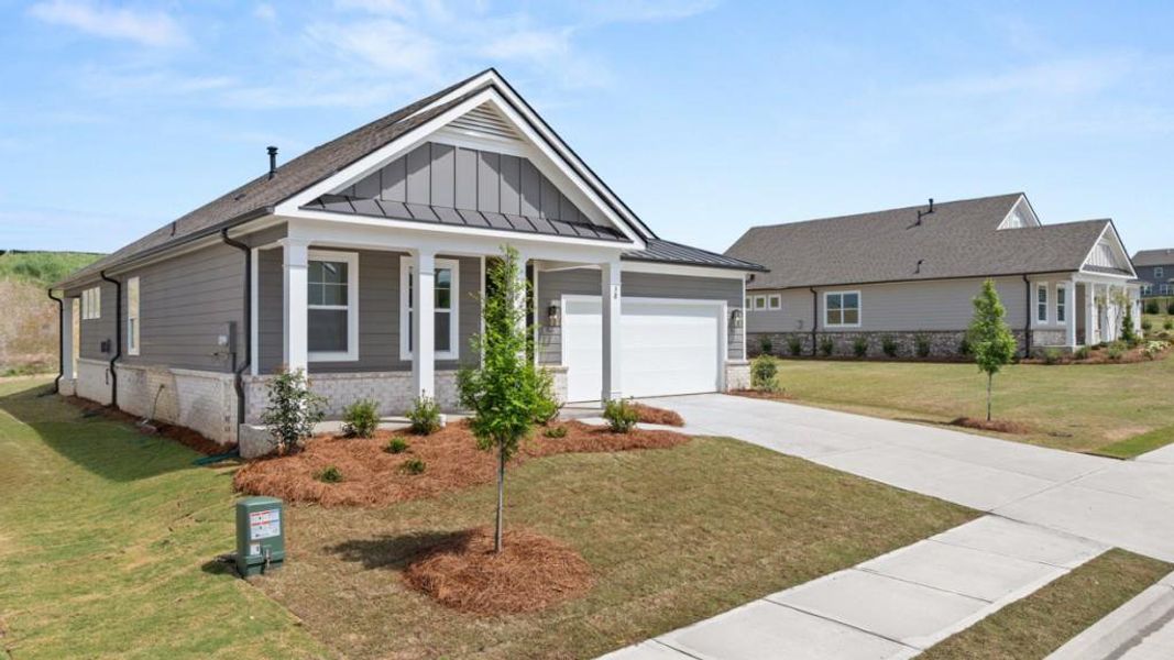 Front exterior of a new home in Hamptons at Riverwood North, Dallas, GA, highlighting curb appeal (Image 19).