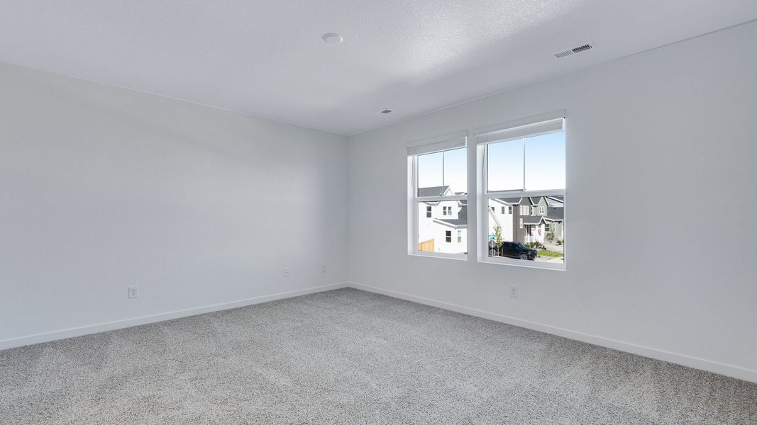 Spacious, unfurnished interior of a new home in Sky Ranch, Watkins (Image 17).