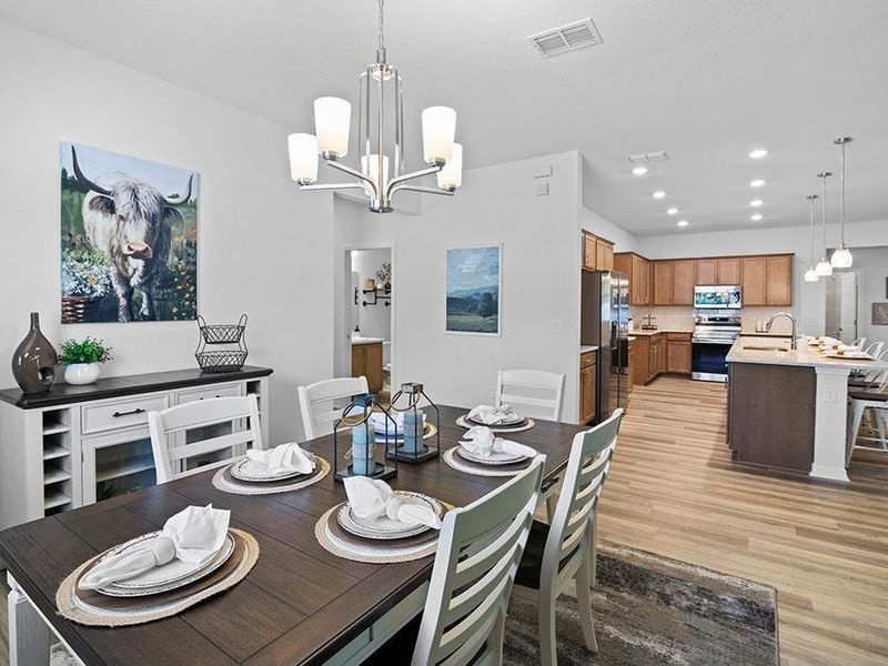 This home includes a dining room, which can be as formal or casual as you like - Summerlyn II by Highland Homes