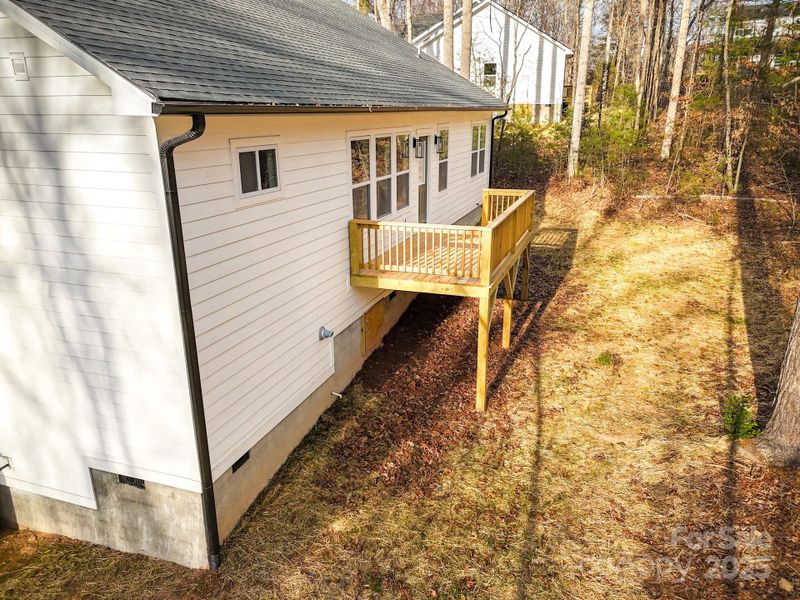Exterior details and patio area of a home in , Swannanoa (Image 24).