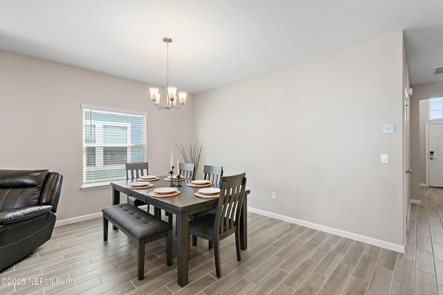 Furnished interior view inside a new home in Gentle Woods North, Jacksonville (Image 7).
