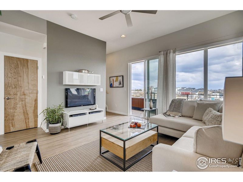 Large floor to ceiling windows. Photos are of the model home.