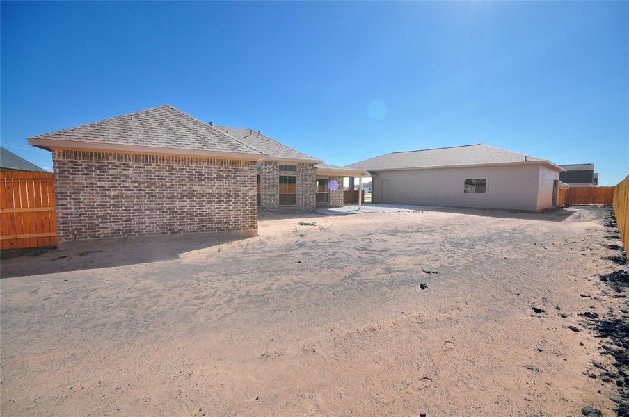 Room for all kinds of outdoor activities in this rear yard. Room for all kinds of outdoor activities in this rear yard.