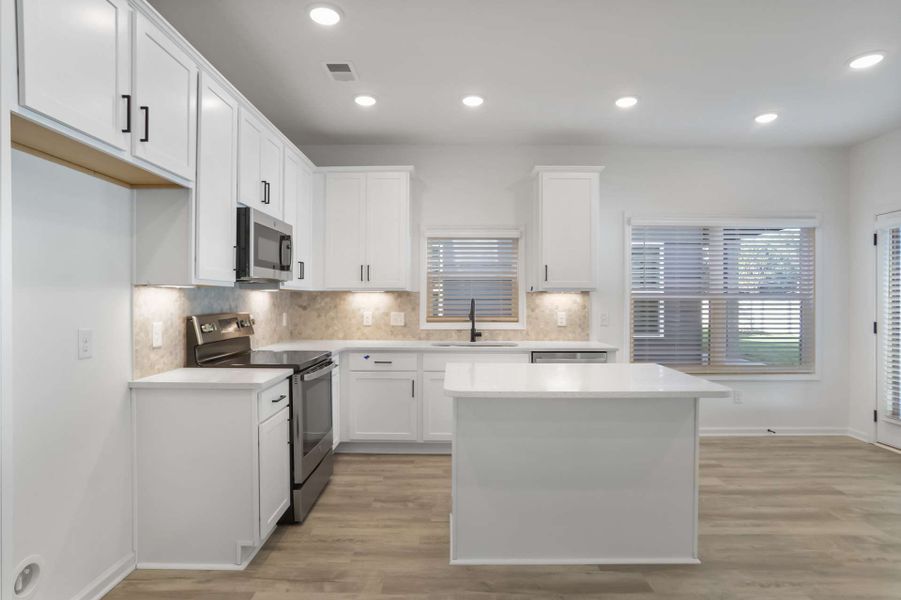 Representative furnished interior of a home built from the Khloe by KM Homes in The Cottages at Jackson Heights, Cleveland (Image 15).