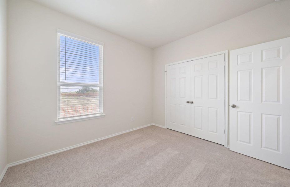 Spacious, unfurnished interior of a new home in Sunfield, Buda (Image 11). Spacious, unfurnished interior of a new home in Sunfield, Buda (Image 11).