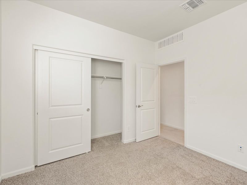 Spacious, unfurnished interior of a new home in Las Patrias at Star Valley Phase III - Signature Series, Tucson (Image 13).