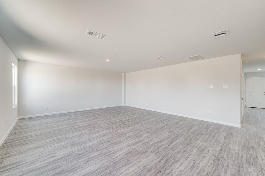 Representative unfurnished interior of a home built from the Harrison by National HomeCorp in Splawn Ranch, Killeen (Image 19).