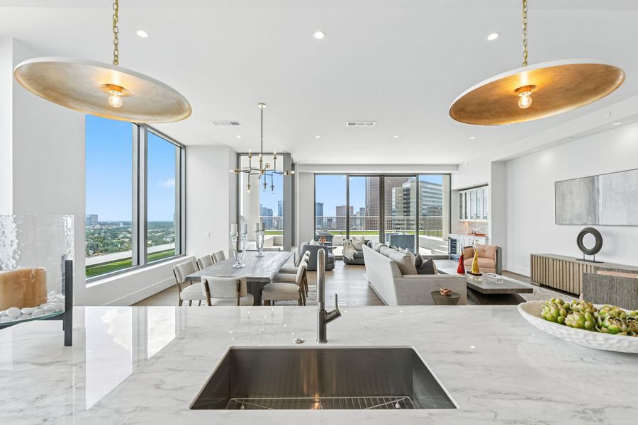 Open concept of the living/dining area adding multi-functional space with flow that makes it easier to entertain and interact with guests Open concept of the living/dining area adding multi-functional space with flow that makes it easier to entertain and interact with guests