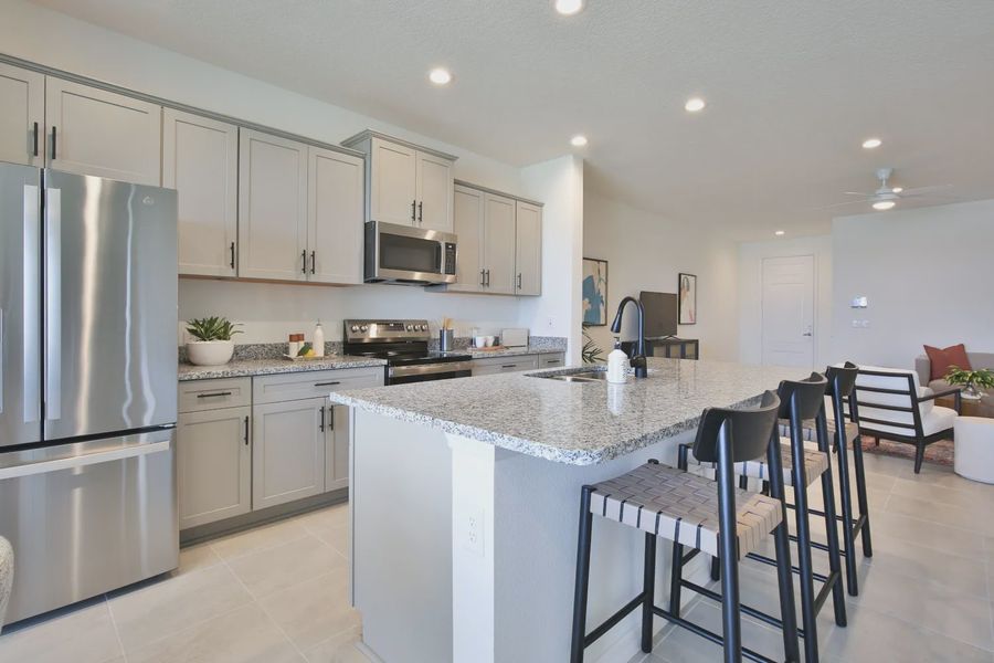 Representative furnished interior of a home built from the Morgan by Neal Communities in SkySail, Naples (Image 23).