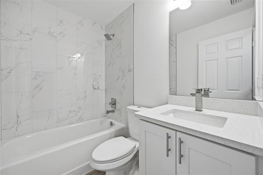 Furnished interior view inside a new home in , Dunnellon (Image 9).