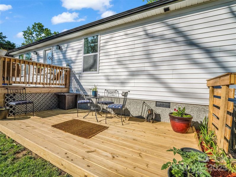 Exterior details and patio area of a home in , Black Mountain (Image 30).