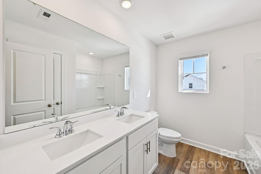 Photo is not of the actual home, but is an inspirational photo of builder’s model home and may depict options, furnishings, and/or decorator features that are not included