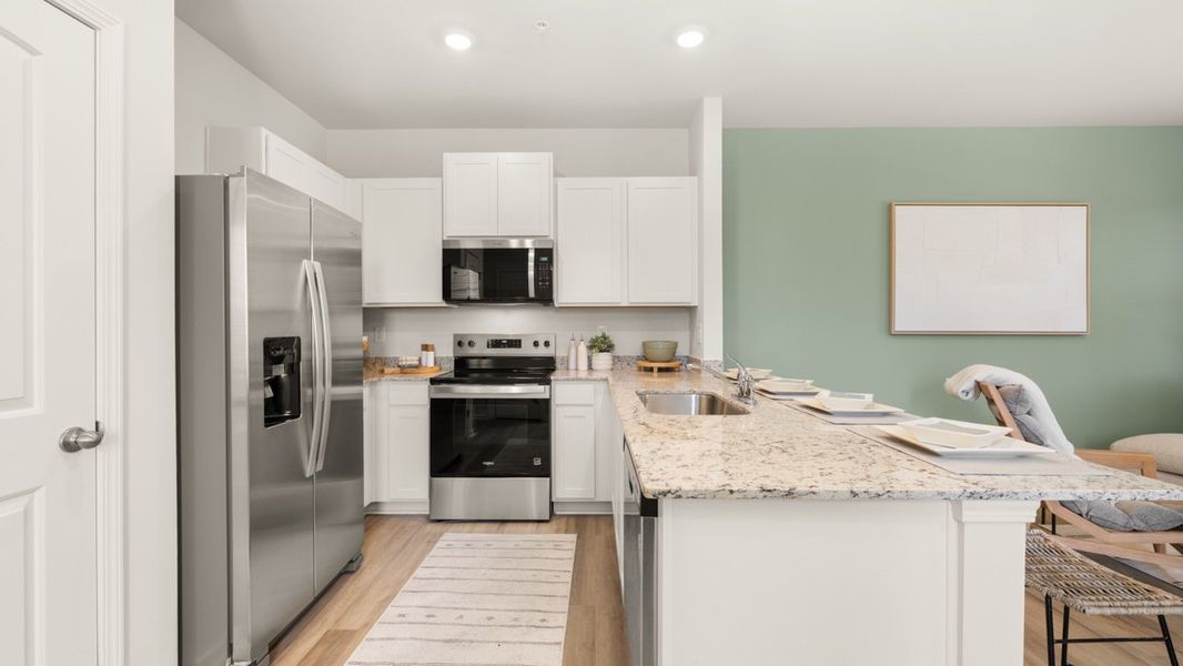 Representative furnished interior of a home built from the Pearson II by D.R. Horton in Roseleigh Park, Douglasville (Image 7).
