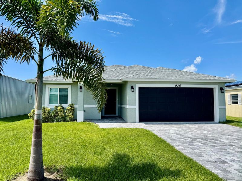 Front exterior of a new home in , Okeechobee, FL, highlighting curb appeal (Image 23).