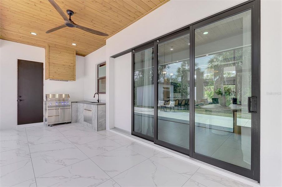 Exterior details and patio area of a home in , North Port (Image 35).