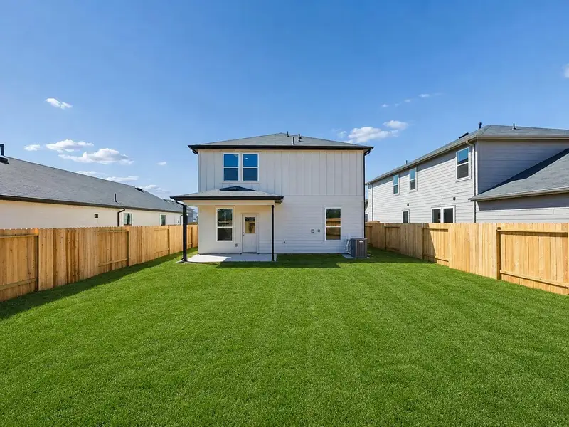 Exterior details and patio area of a home in Montgomery Bend, Montgomery (Image 4).