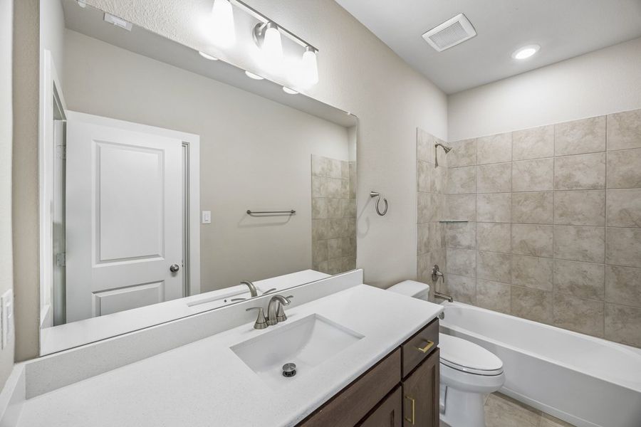 Representative furnished interior of a home built from the The Mockingbird by Lillian Custom Homes in Polo Ridge, Forney (Image 16).