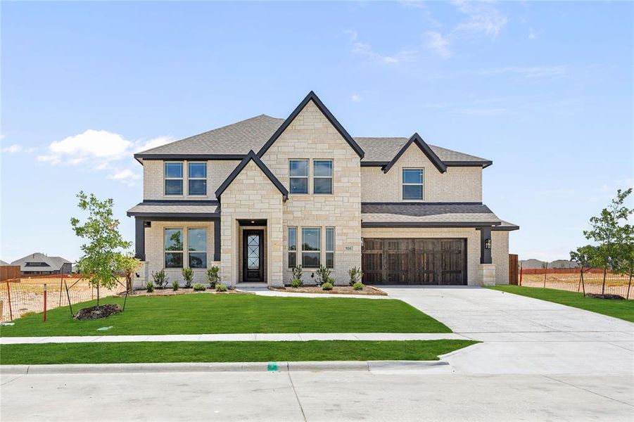 Front exterior of a new home in The Oaks, Red Oak, TX, highlighting curb appeal (Image 26). Front exterior of a new home in The Oaks, Red Oak, TX, highlighting curb appeal (Image 26).