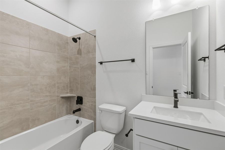 Furnished interior view inside a new home in Aldeana, Bonney (Image 17).