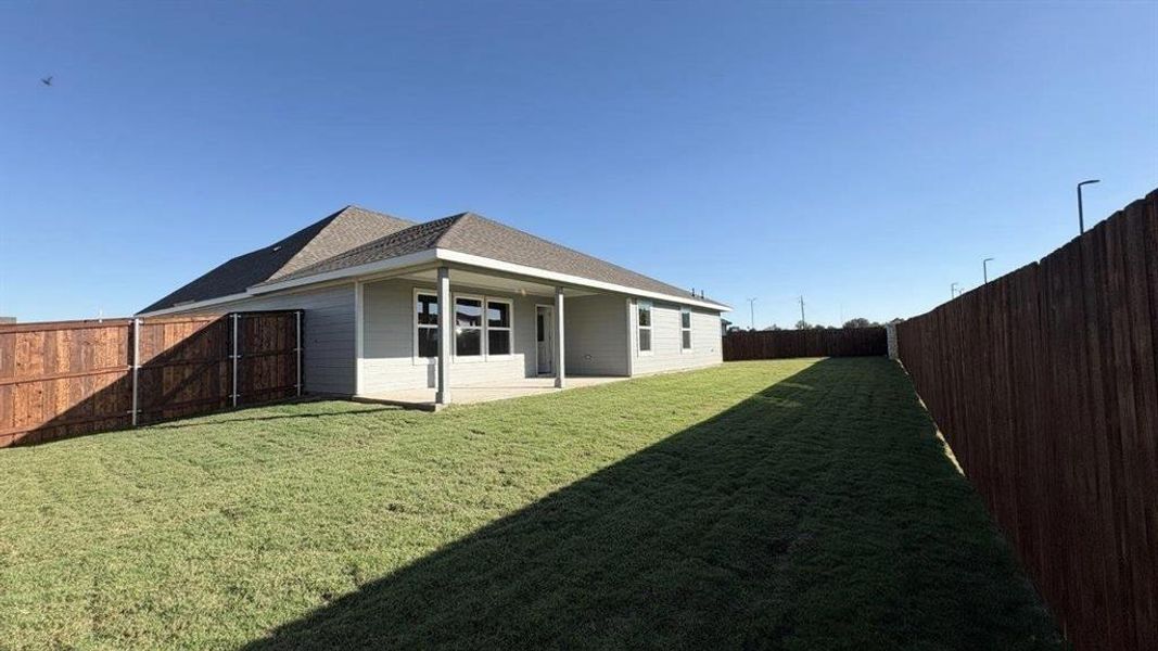 Exterior details and patio area of a home in Sandstone Estates, Granbury (Image 17). Exterior details and patio area of a home in Sandstone Estates, Granbury (Image 17).