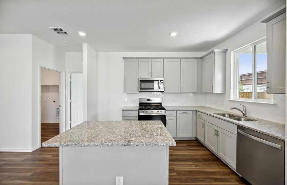 Spacious kitchen with ample cabinet space*real home pictured