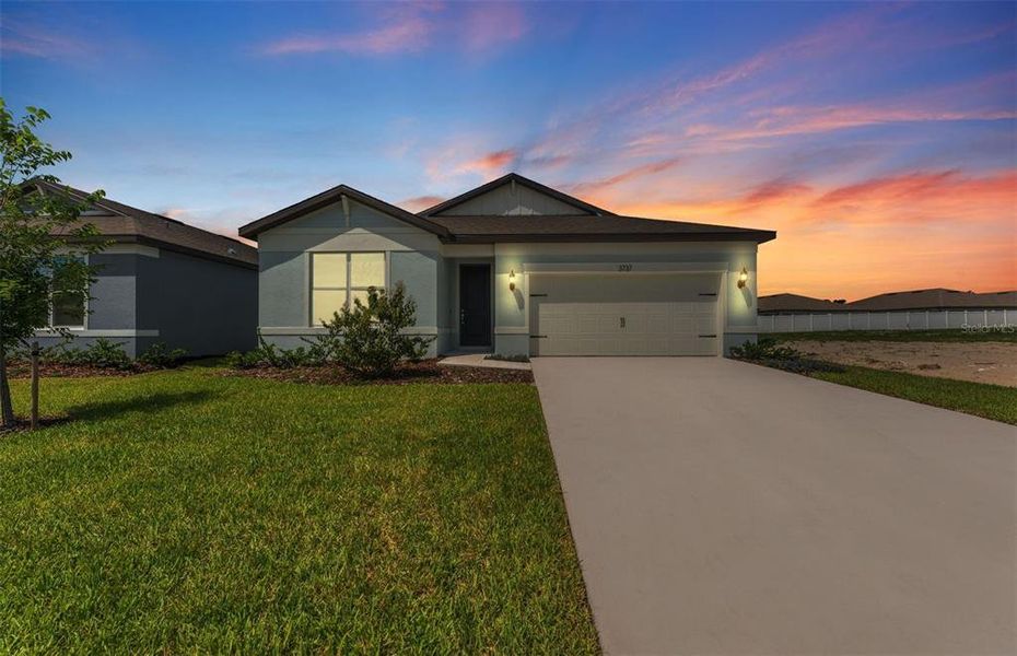 Front exterior of a new home in Caldera, Spring Hill, FL, highlighting curb appeal (Image 1). Front exterior of a new home in Caldera, Spring Hill, FL, highlighting curb appeal (Image 1).