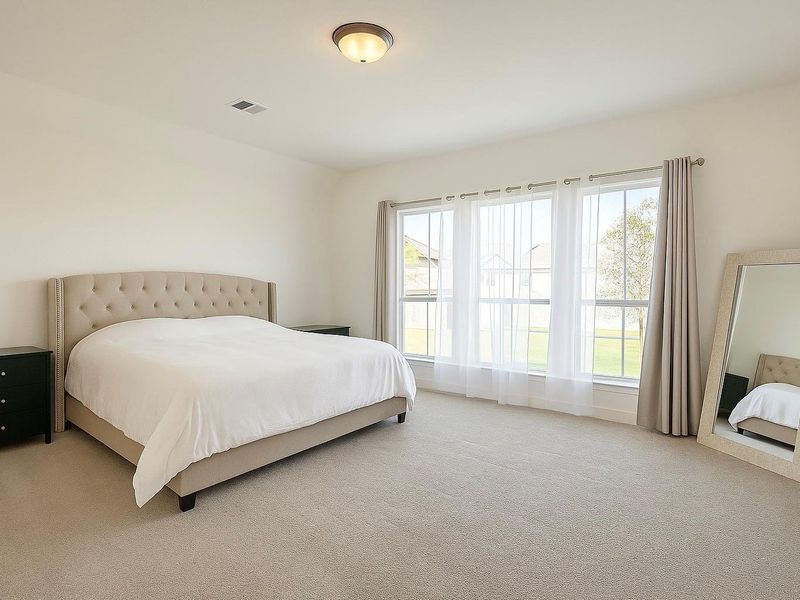 Furnished interior view inside a new home in Bridgeland 45', Cypress (Image 9).