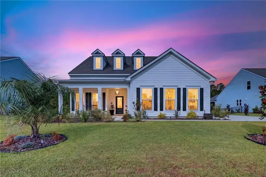 Front exterior of a new home in , Richmond Hill, GA, highlighting curb appeal (Image 26). Front exterior of a new home in , Richmond Hill, GA, highlighting curb appeal (Image 26).