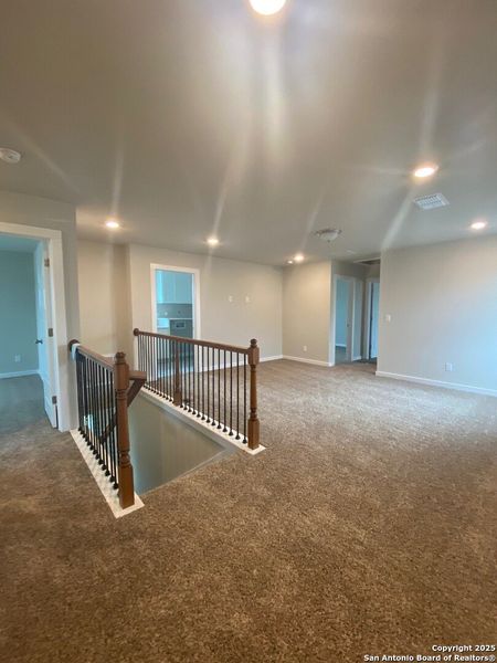 Furnished interior view inside a new home in Highland Ridge, New Braunfels (Image 13). Furnished interior view inside a new home in Highland Ridge, New Braunfels (Image 13).