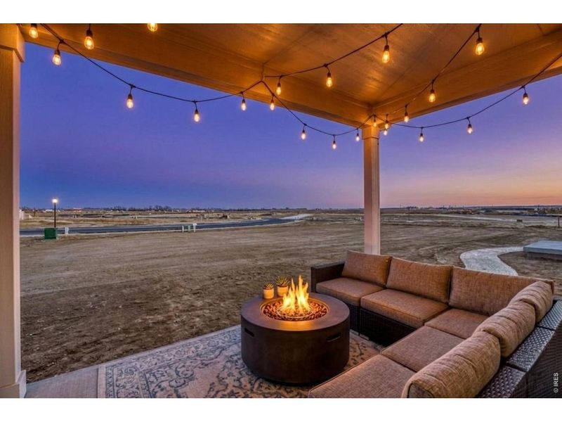 Exterior details and patio area of a home in Farmstead, Berthoud (Image 18).