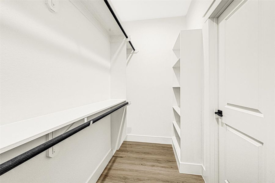 Large walk in closet in primary bedroom