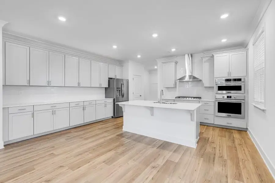 Furnished interior view inside a new home in Wellington Estates, Madison (Image 5).