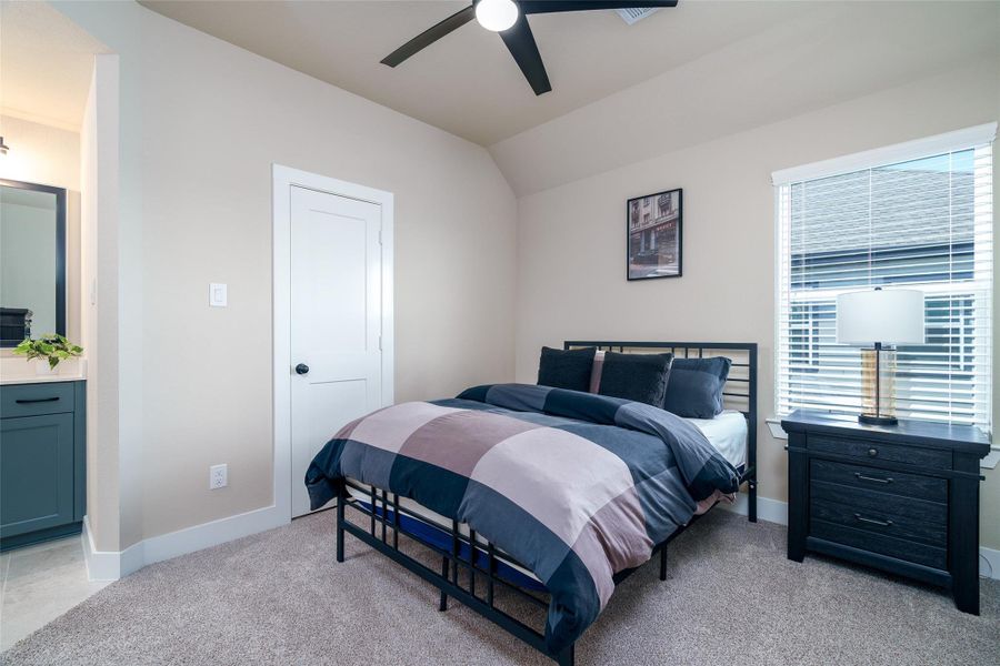 This bedroom features the convenience of a private sink and direct access to a shared bathroom, offering both privacy and functionality. This bedroom features the convenience of a private sink and direct access to a shared bathroom, offering both privacy and functionality.