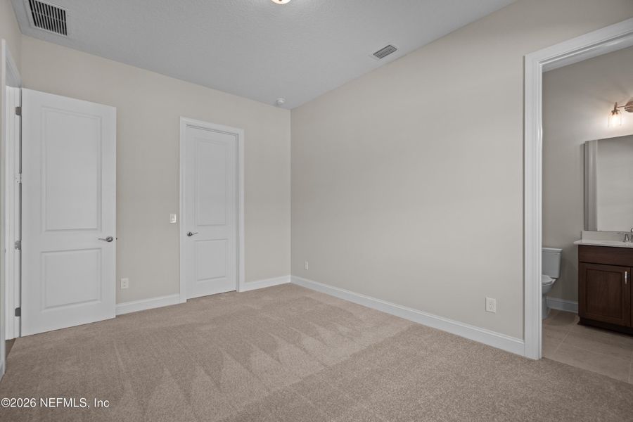 Spacious, unfurnished interior of a new home in SilverLeaf, St. Augustine (Image 37).