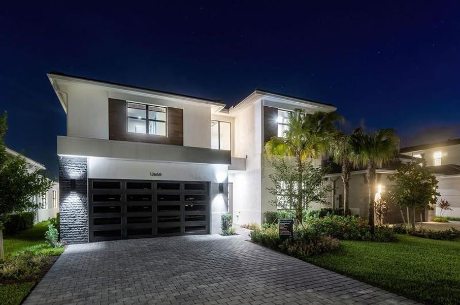 Front exterior of a new home in , Palm Beach Gardens, FL, highlighting curb appeal (Image 1). Front exterior of a new home in , Palm Beach Gardens, FL, highlighting curb appeal (Image 1).