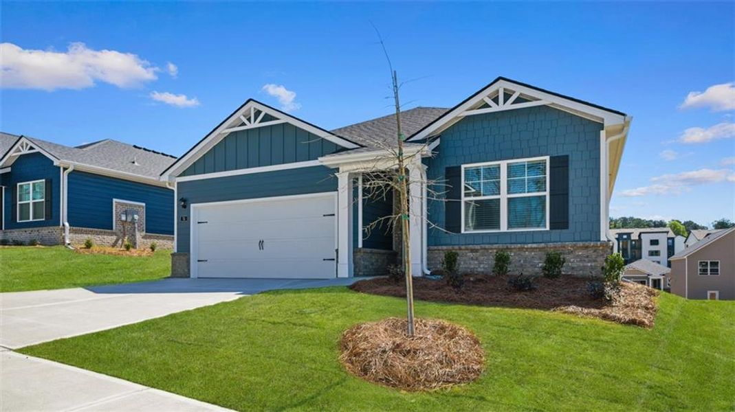 Front exterior of a new home in Willowbrook, Winder, GA, highlighting curb appeal (Image 1). Front exterior of a new home in Willowbrook, Winder, GA, highlighting curb appeal (Image 1).